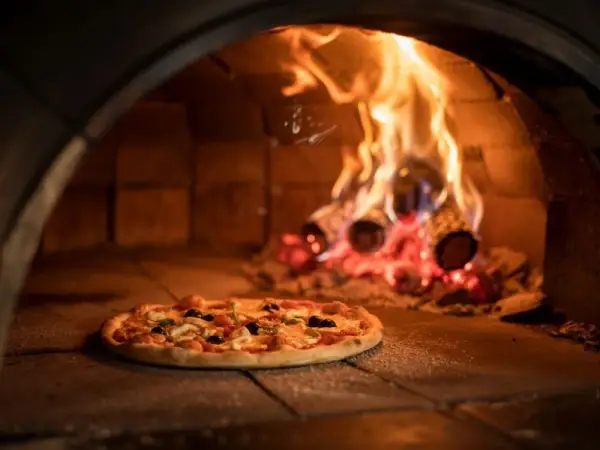 Na jakim trybie piec pizzę? Odkryj sekrety idealnego spodu!